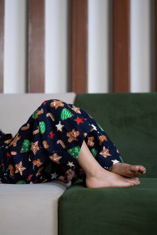 Crafted from a premium cotwool blend, this nightwear set features charming winter-themed prints, providing the perfect mix of comfort and seasonal cheer for your little one.