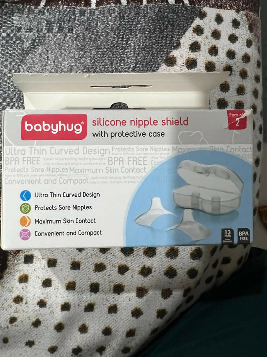 Protect your nipples and enhance breastfeeding comfort with the BABYHUG Nipple Shield, made from soft, BPA-free silicone for a natural and soothing nursing experience.