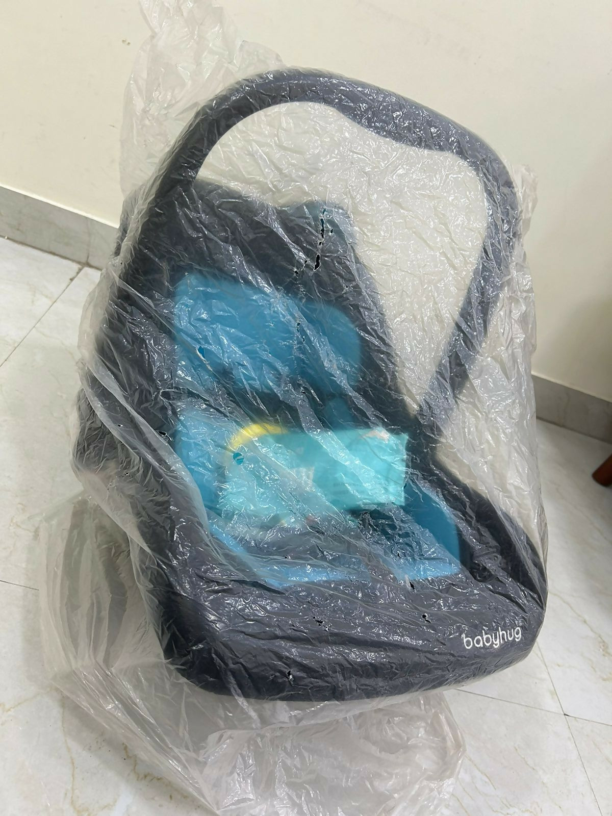 Shop now for the BabyHug Amber Car Seat cum Carry Cot with Rocking Base, offering safety, comfort, and versatility for your baby!