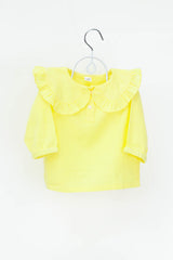 Shop the 100% cotton yellow frill top for girls, featuring breathable fabric and elegant frill details for a stylish and comfortable look.