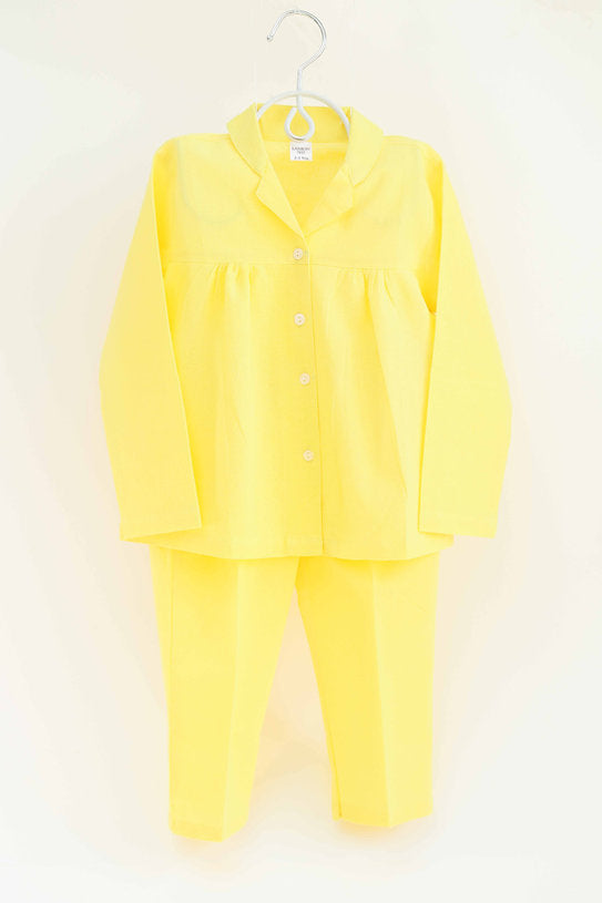 Shop bright yellow 100% cotton nightwear for girls, offering softness and comfort for a restful night's sleep.
