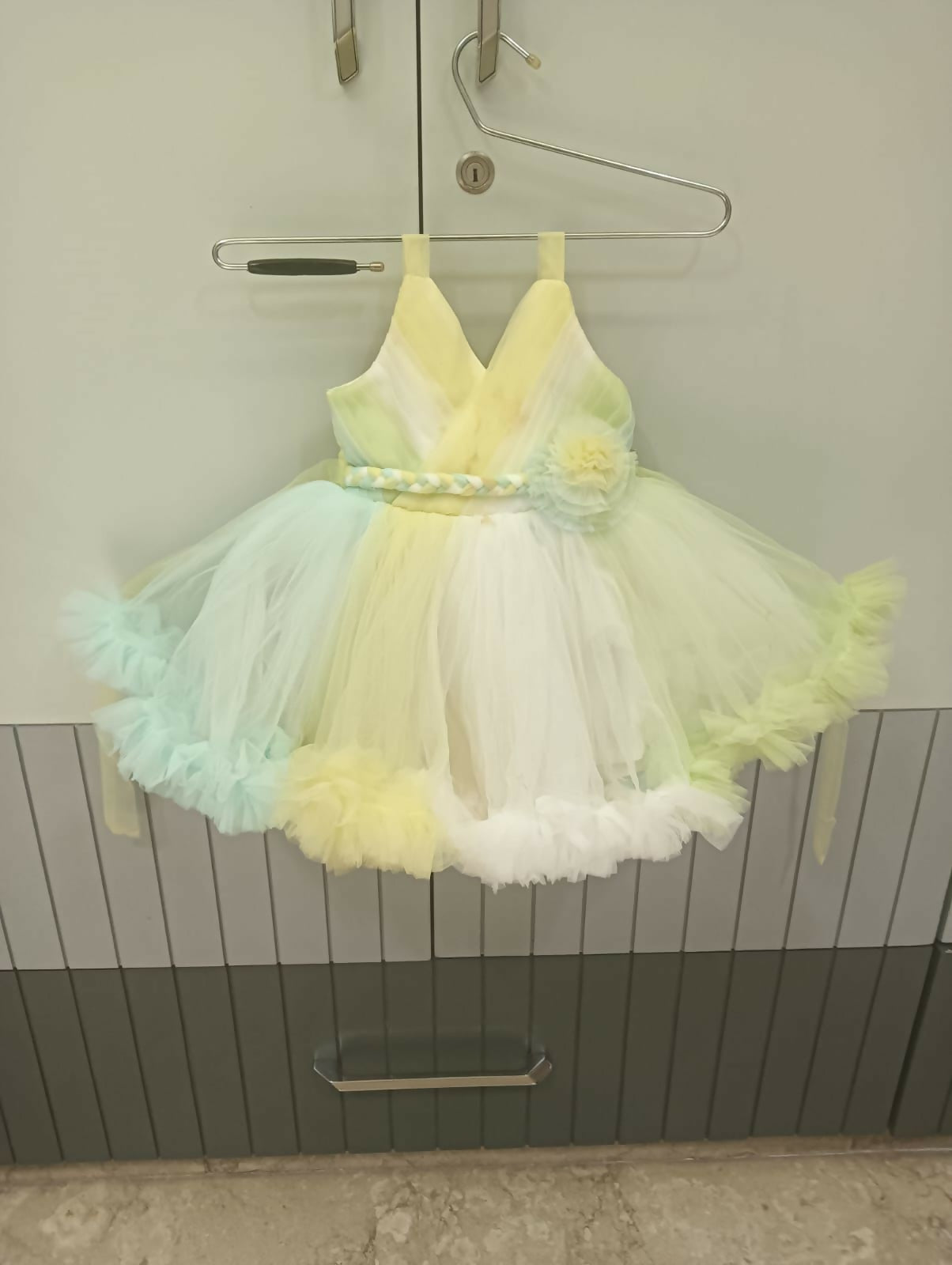 Brighten up your baby girl's wardrobe with this adorable multi-color frock/dress, designed for both style and comfort.