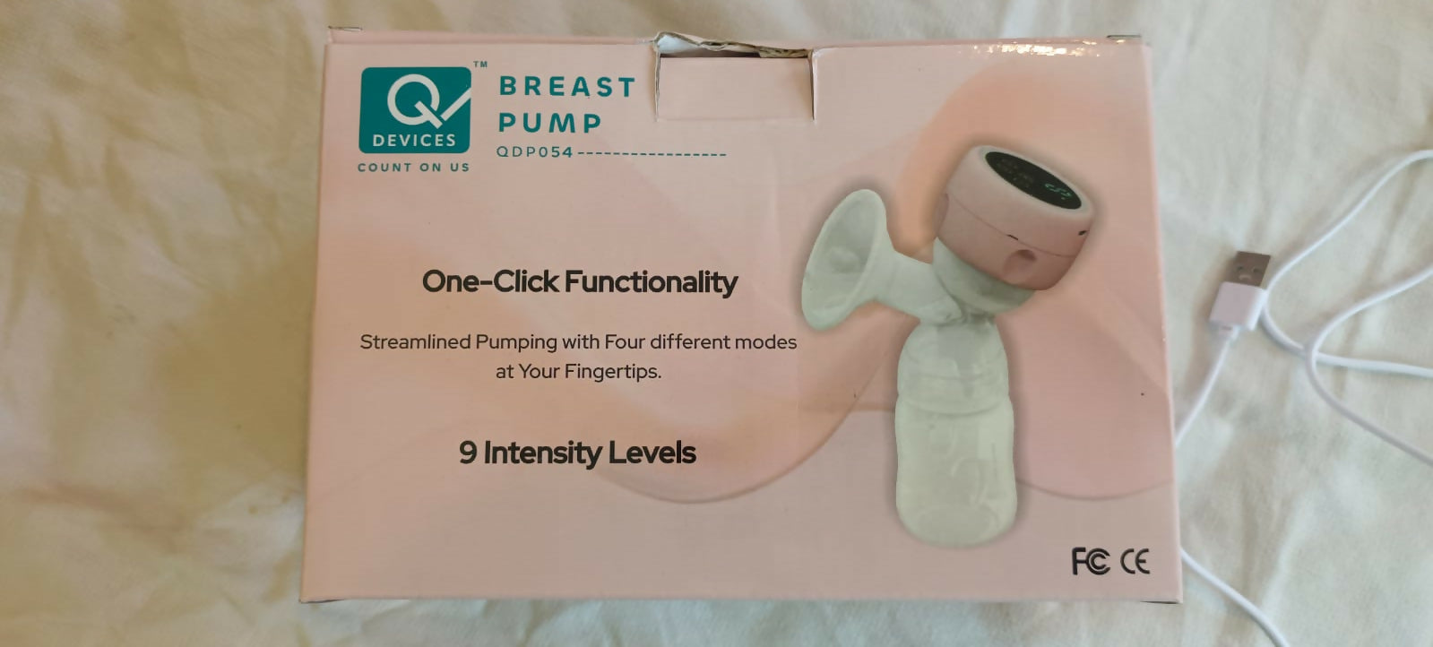  Q Devices Breast Pump QD P054 – Portable, Quiet, and Efficient Pumping Solution for Nursing Mothers.