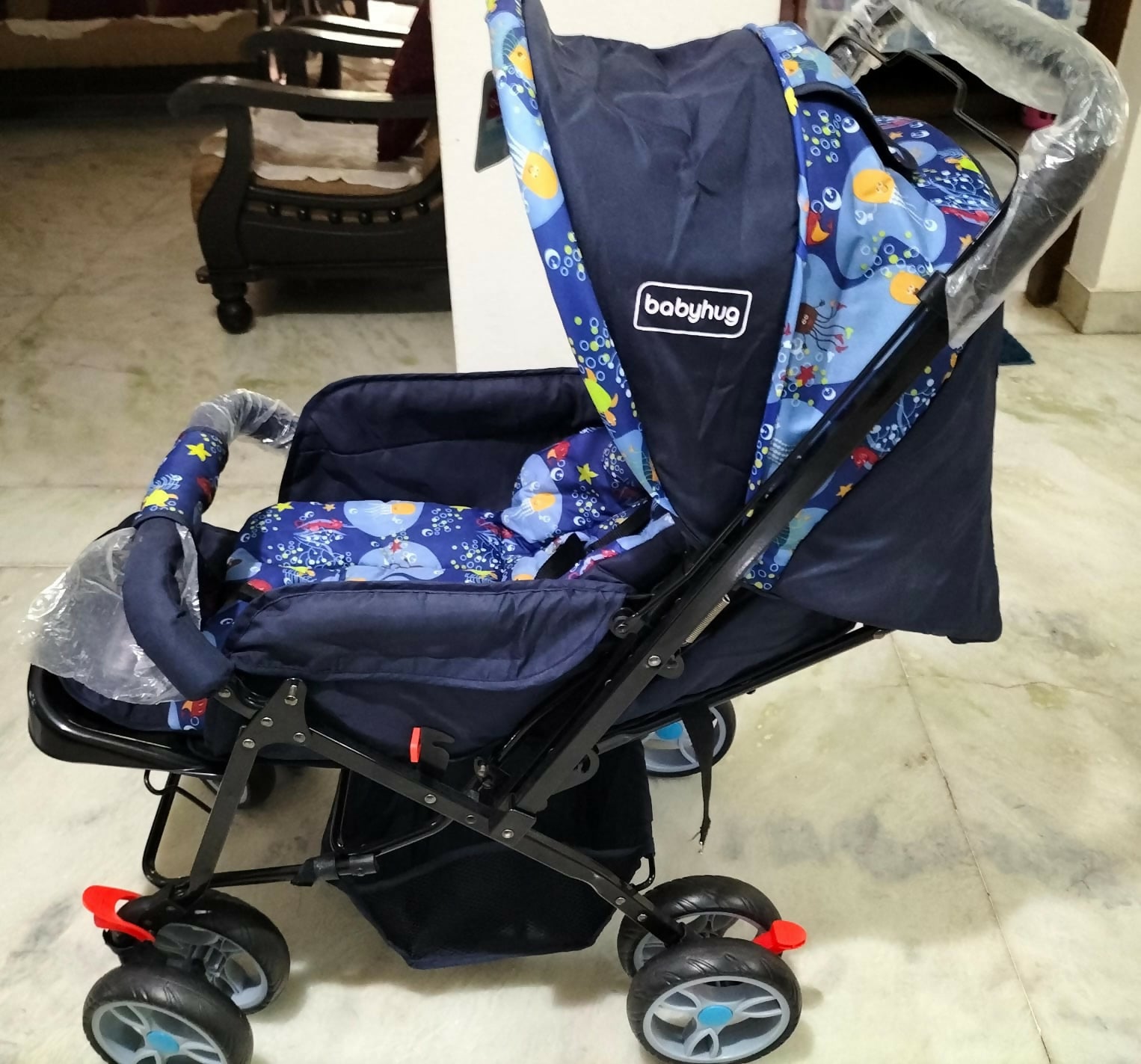 Comfortable and secure BABYHUG Stroller/Pram with a 5-point safety harness, multi-position reclining seat, and easy foldable design.