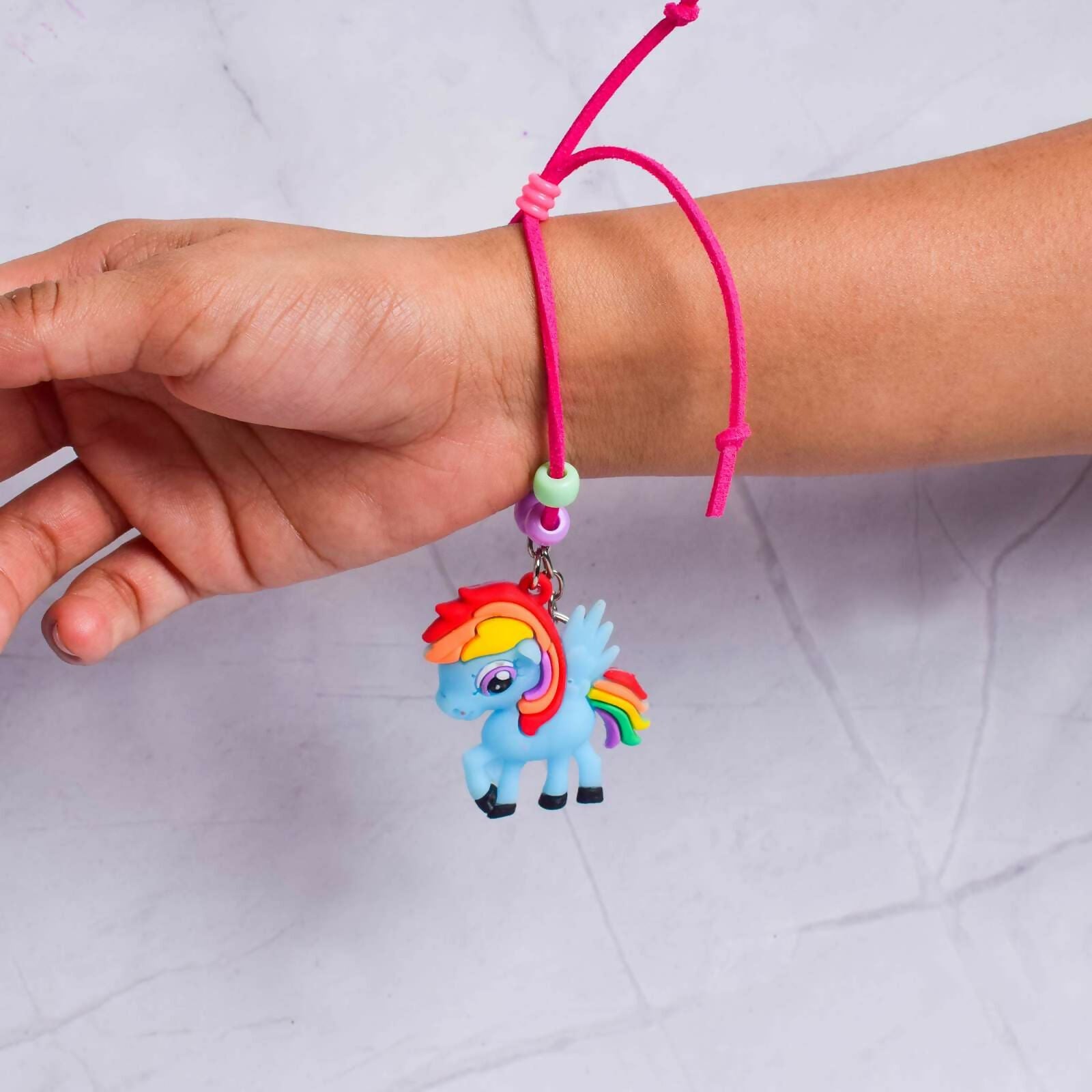 Whether they're fascinated by colors, love their favorite cartoon characters, or enjoy practical gifts, this rakhi is sure to make their day extra special.