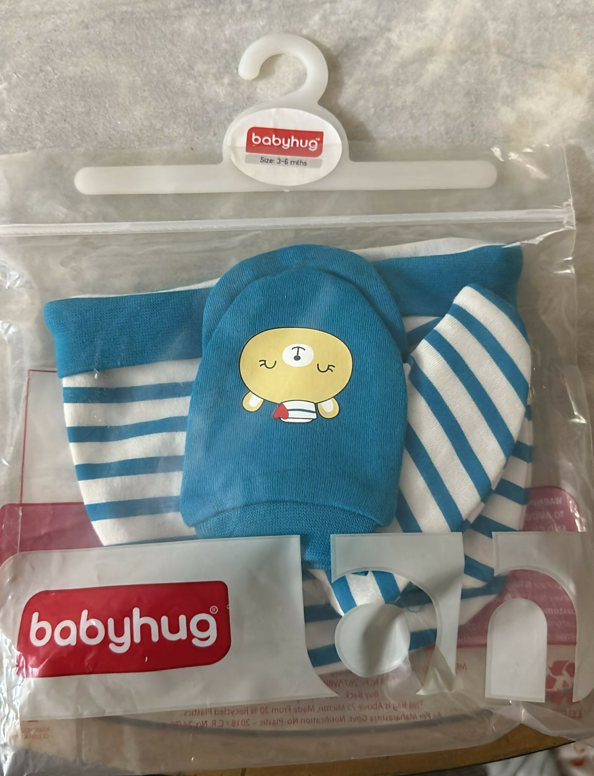 Bundle up your baby in warmth and style with the BABYHUG Cap, Gloves, and Mittens set, perfect for cold weather adventures!