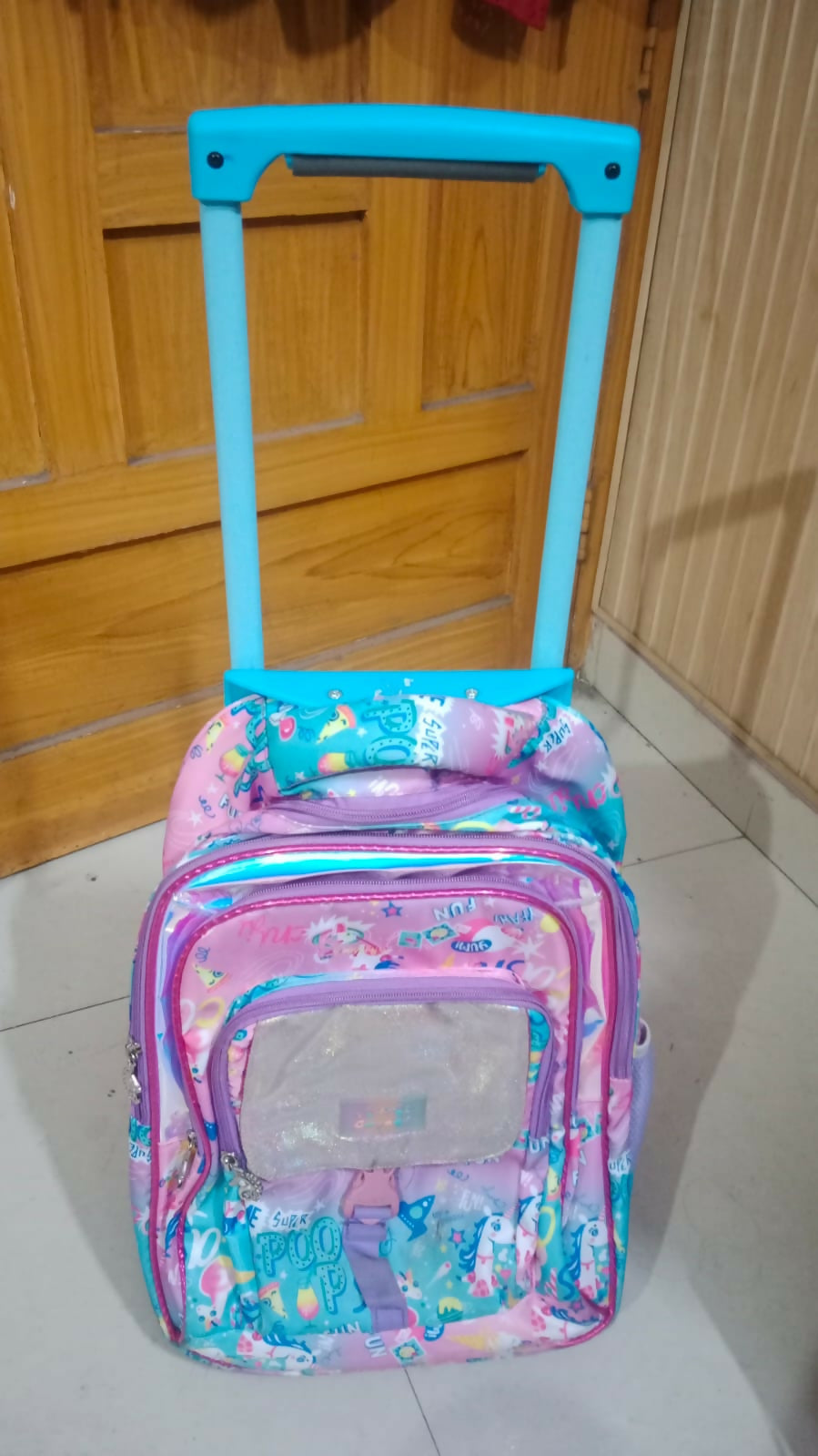 Simplify school days with our School Bag in Trolley Style, offering convenience and style for young students on the go.