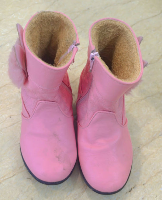 Cute and cozy Pink Booties for Baby Girls, designed for comfort and style with soft, breathable fabric and a secure fit.