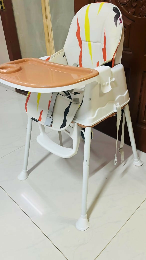 Make mealtime comfortable and safe with the BABYHUG Comfy Highchair – featuring a stylish brown design, printed cushion, adjustable tray, and five-point safety harness for your baby's convenience.