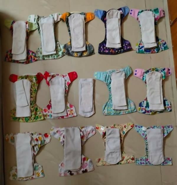 SuperBottoms Cloth Diapers: Eco-friendly, reusable, and adjustable freesize diapers for babies, featuring organic cotton