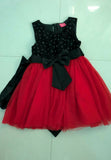 Beautiful red and black frock for baby girls, perfect for parties, birthdays, and festive events with stylish and comfy design.