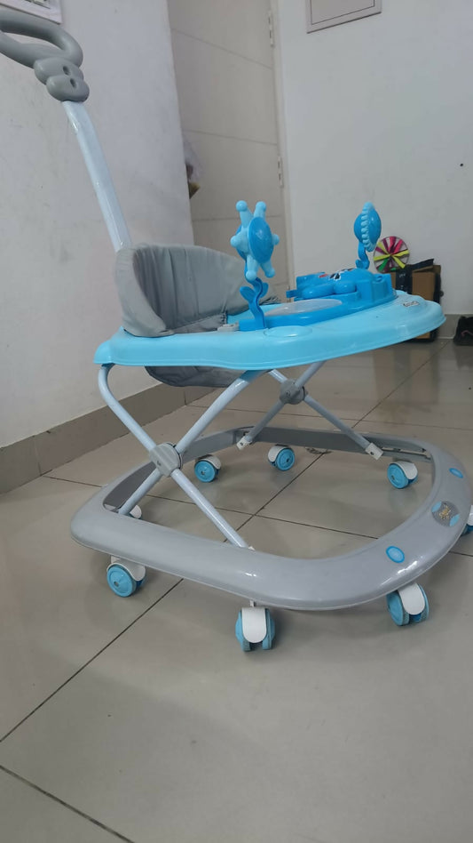 Help your baby take their first steps with the NHR Dash Butterfly Deluxe Baby Walker—adjustable, foldable, and packed with fun music and lights!