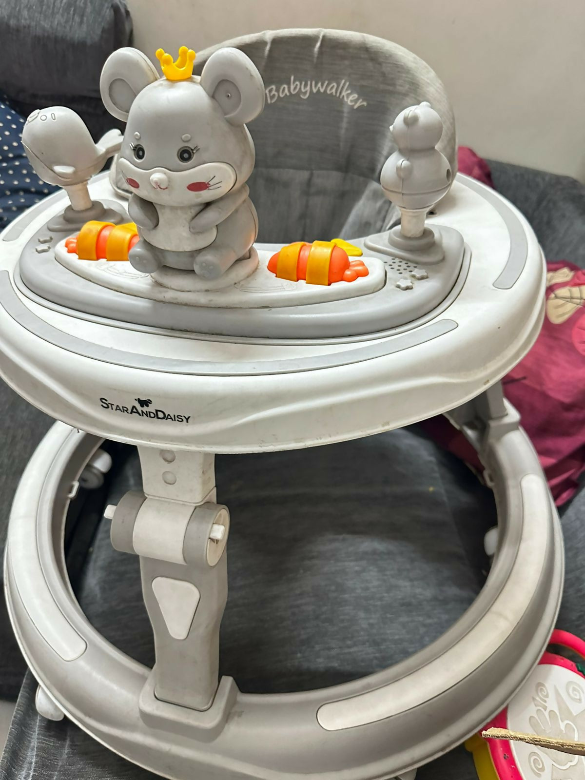 Shop now for the STAR AND DAISY Baby Walker in Grey, combining stability, comfort, and interactive fun to support your baby’s first steps!