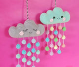 Discover our handcrafted Crochet Cloud Wall/Cradle Hanger, designed to elevate your baby's nursery with its soft, durable yarn and charming cloud motif.