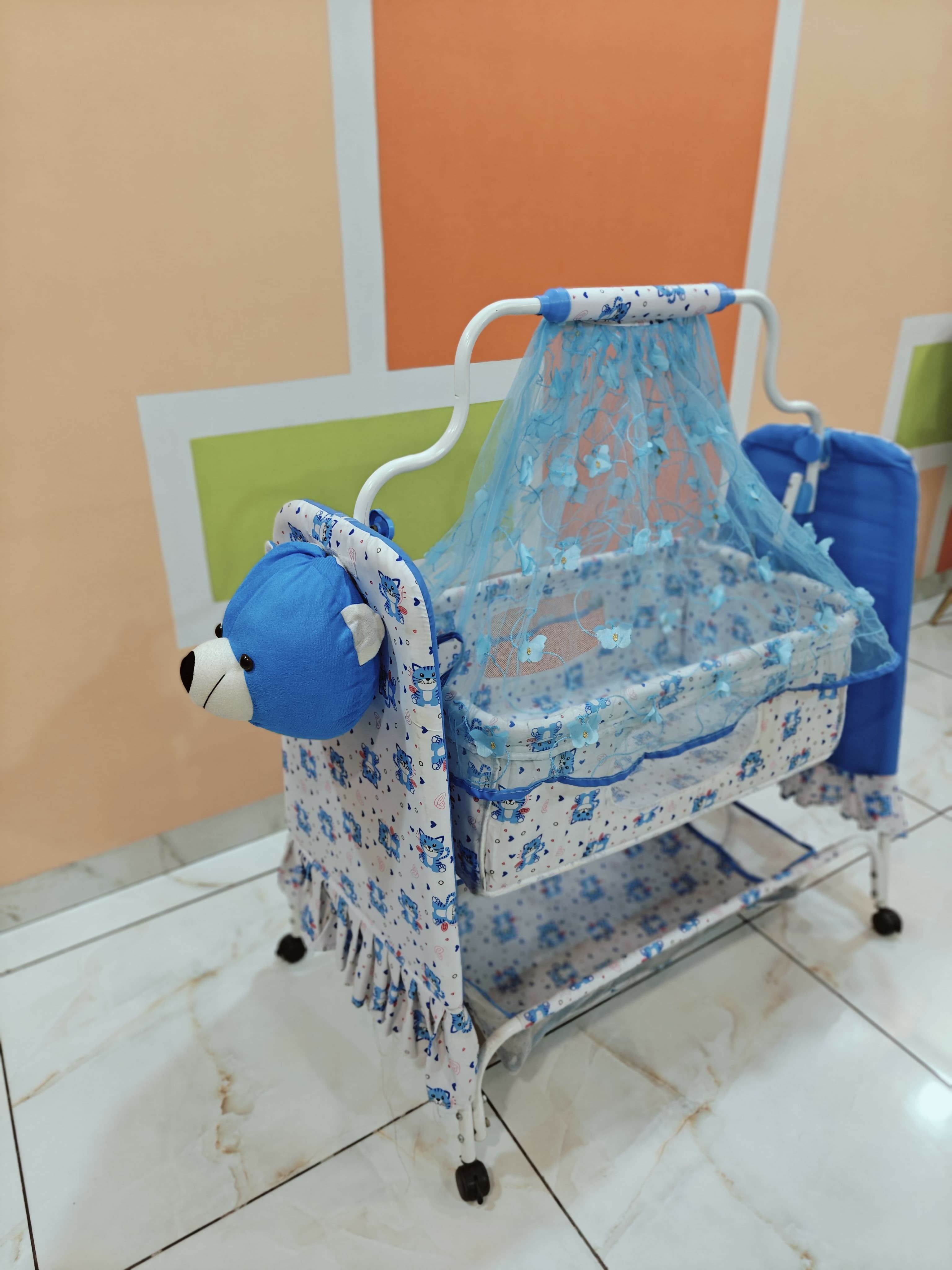 Manual Cradle for Baby in Blue: Safe, portable, and designed for soothing naps with gentle rocking motion.