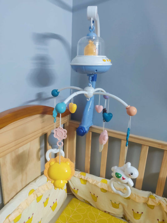 PATPAT Musical Cot Mobile with remote control – soothing melodies, rotating design, and plush toys for baby entertainment and comfort.