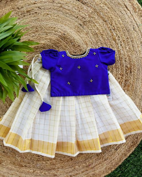 Introduce your child to the elegance of traditional Kerala fashion with this Kerala Style Frock/Dress for kids.