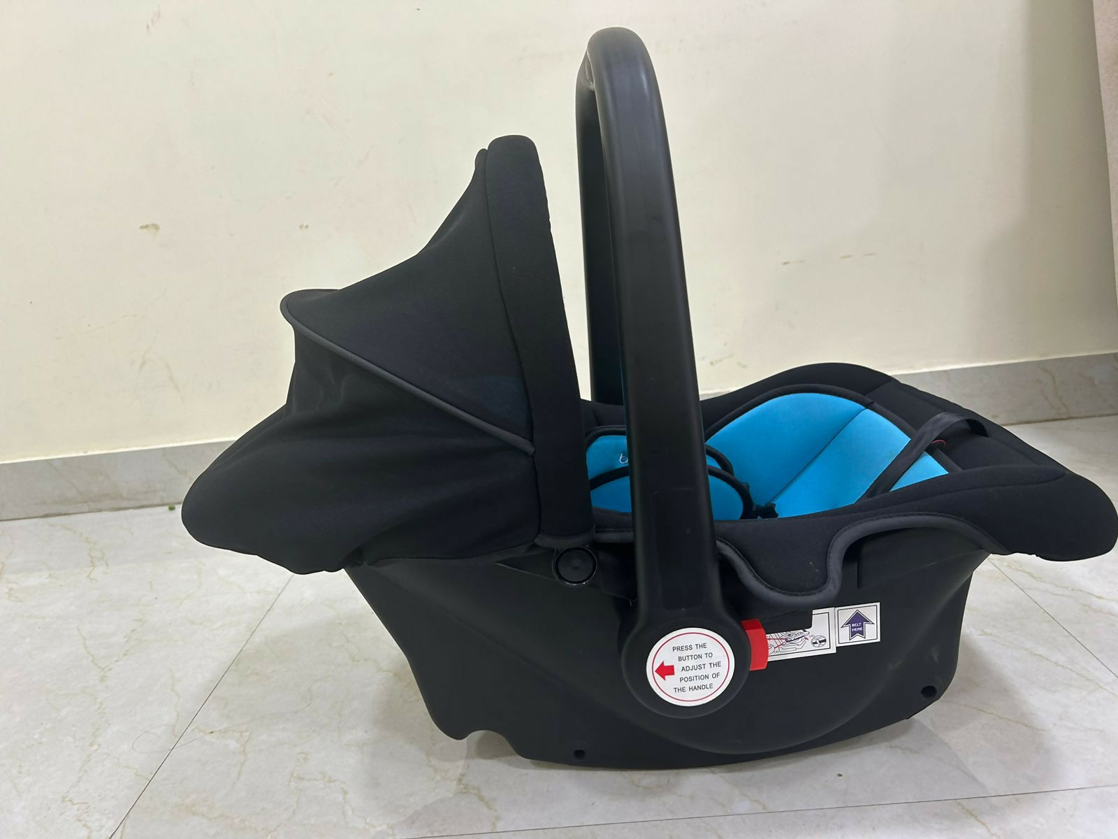 Shop now for the BabyHug Amber Car Seat cum Carry Cot with Rocking Base, offering safety, comfort, and versatility for your baby!