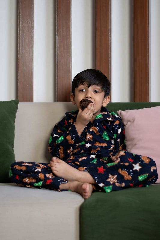 Crafted from a premium cotwool blend, this nightwear set features charming winter-themed prints, providing the perfect mix of comfort and seasonal cheer for your little one.