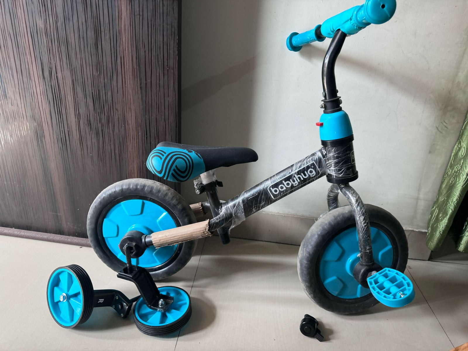 Start your child's cycling journey with the BABYHUG 4 in 1 Balance Bike, offering four modes for growing riders to explore and develop their skills.