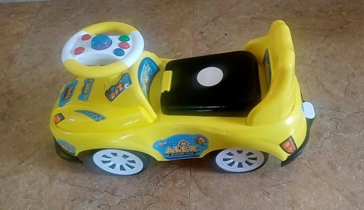 Ride-On Car for Baby - Yellow: Fun, durable, and safe, ideal for active play and skill development.