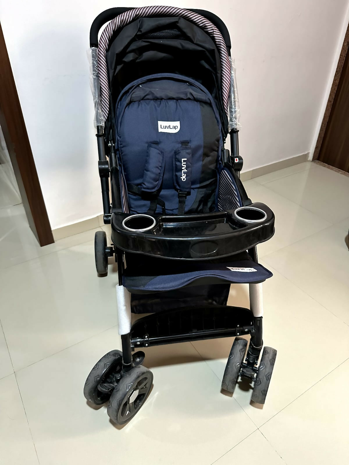 Experience ultimate comfort and safety with the LUVLAP Galaxy Stroller/Pram – featuring multi-position reclining seat, sturdy wheels, and reversible handle for easy travel with your baby.