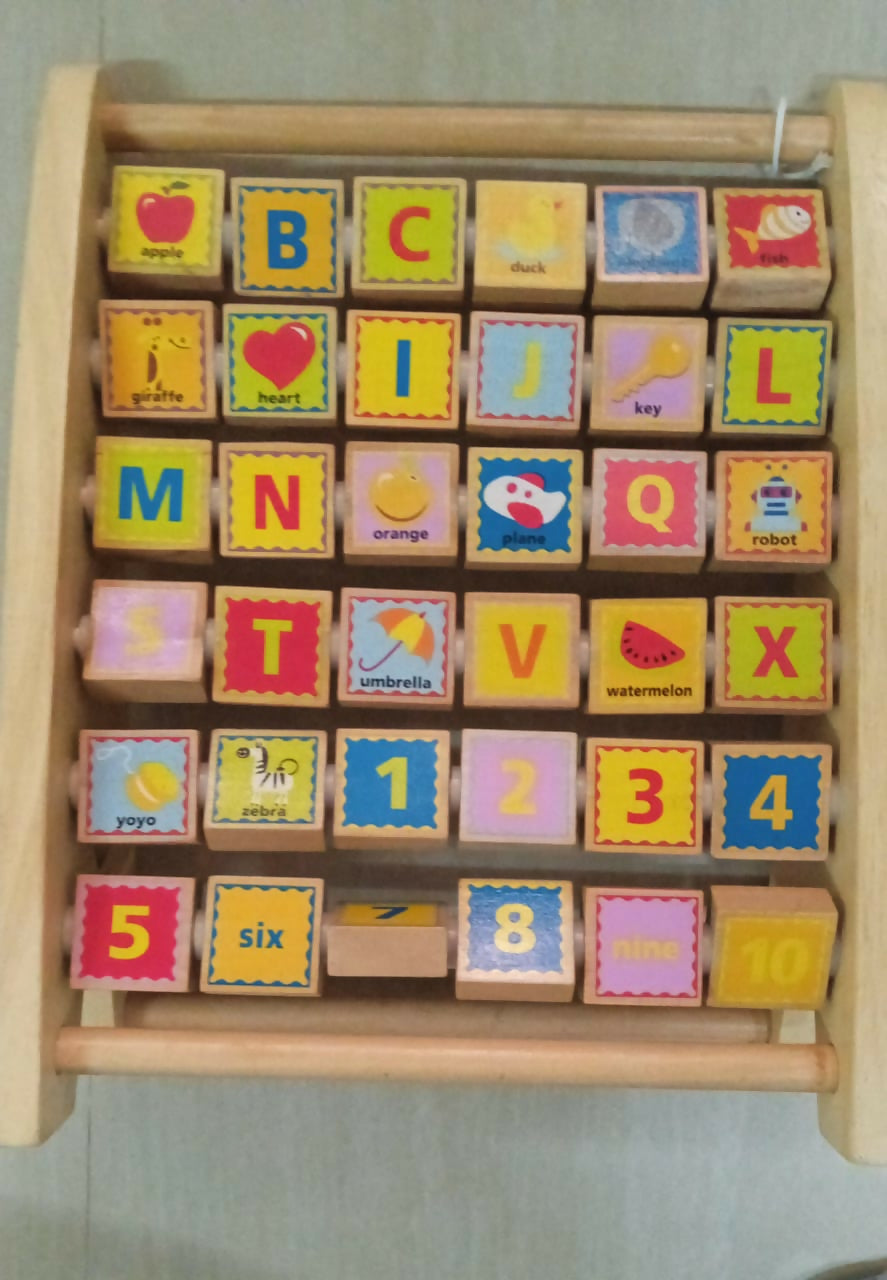 Enhance your child's early math and literacy skills with the Hape Alphabet Abacus Wooden Counting Toy – featuring colorful beads for counting and alphabet blocks for letter recognition, crafted from high-quality, durable wood.