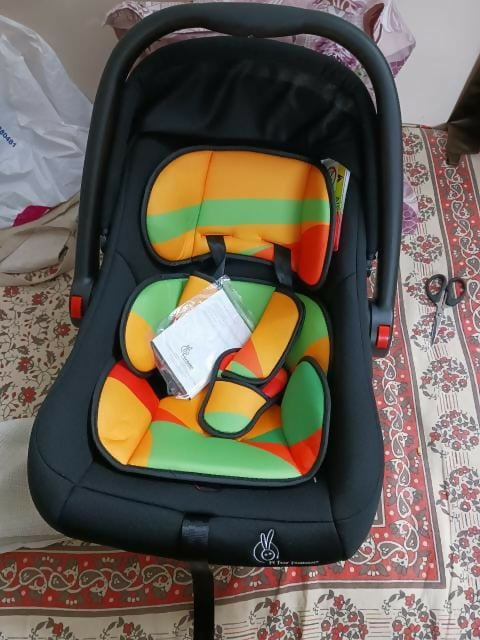 R for Rabbit Picaboo Infant Car Seat Cum Carry Cot - Multicolour: Safety and Comfort for Your Baby on the Go.