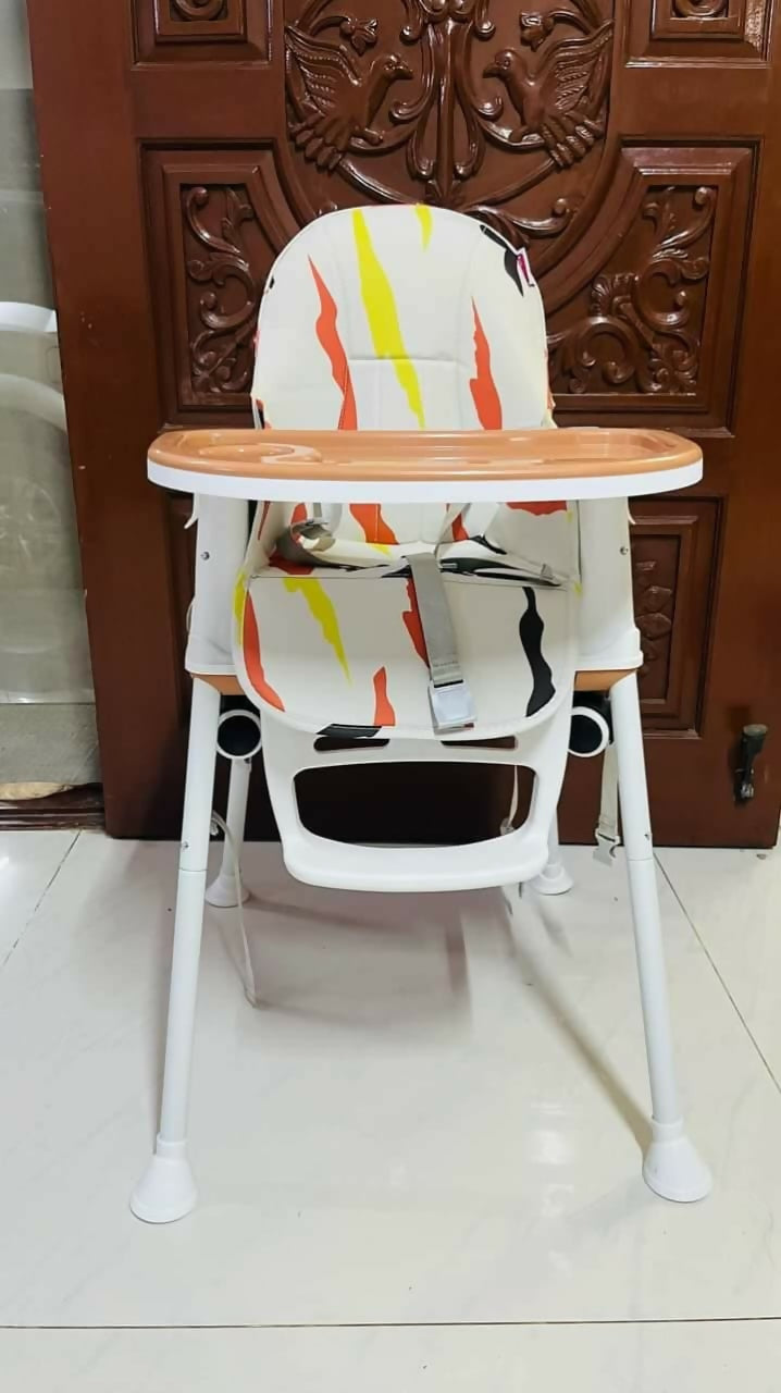 Make mealtime comfortable and safe with the BABYHUG Comfy Highchair – featuring a stylish brown design, printed cushion, adjustable tray, and five-point safety harness for your baby's convenience.