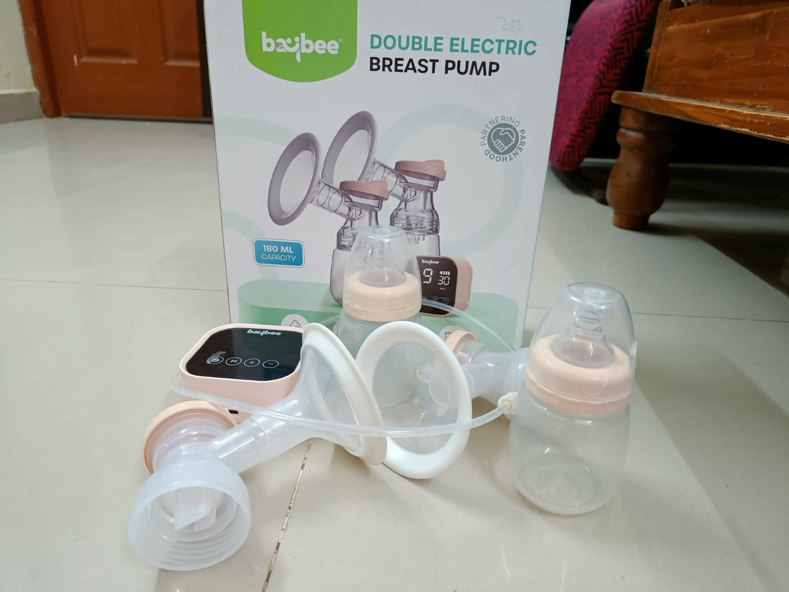 Experience efficient, comfortable, and safe milk expression with the BAYBEE Double Electric Breast Pump, designed for modern moms on the go!