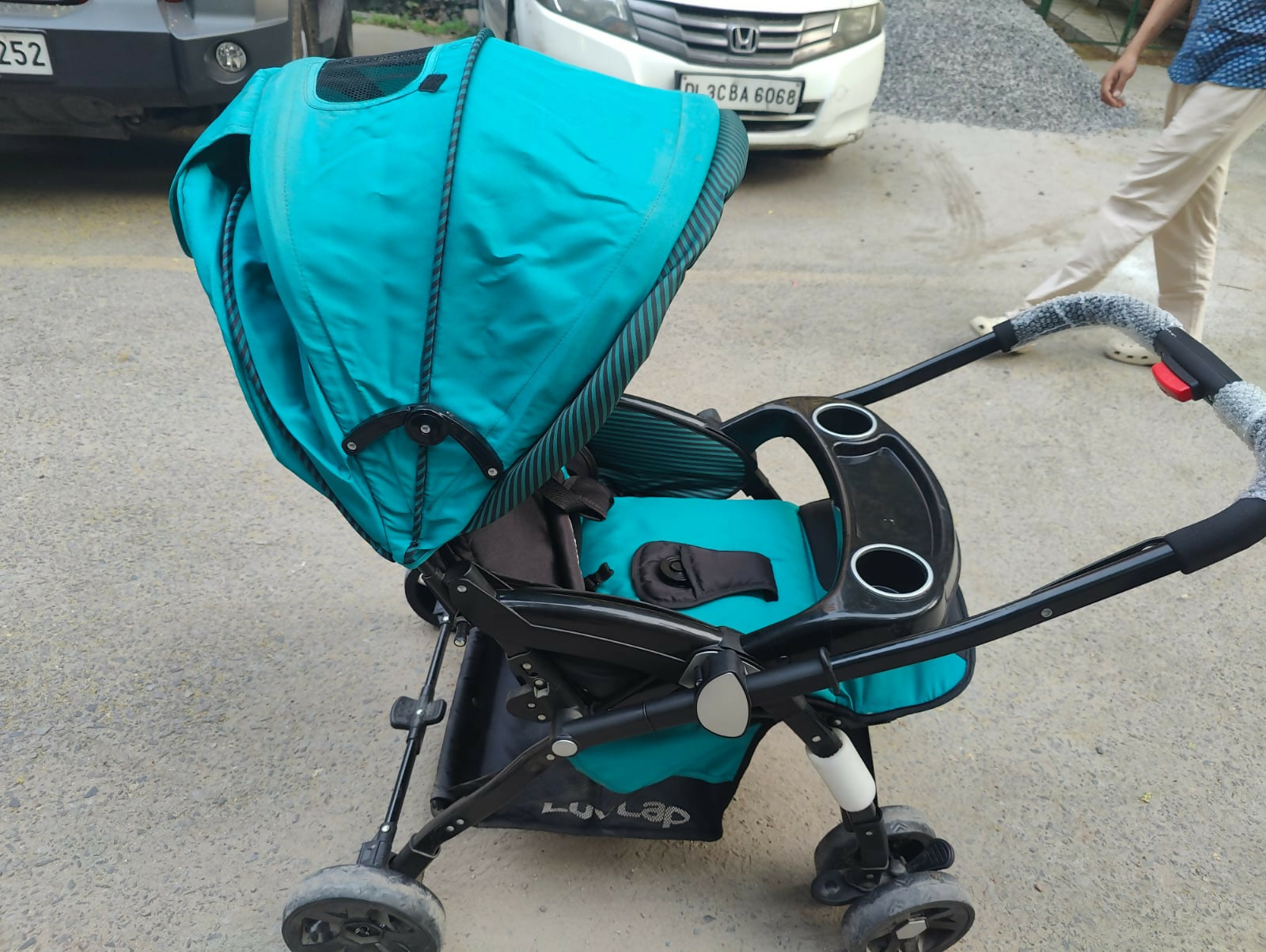 Enjoy stress-free outings with your baby with the LUVLAP Galaxy Stroller/Pram, featuring a comfortable seat, adjustable canopy, and convenient one-hand fold mechanism for easy storage and transport.