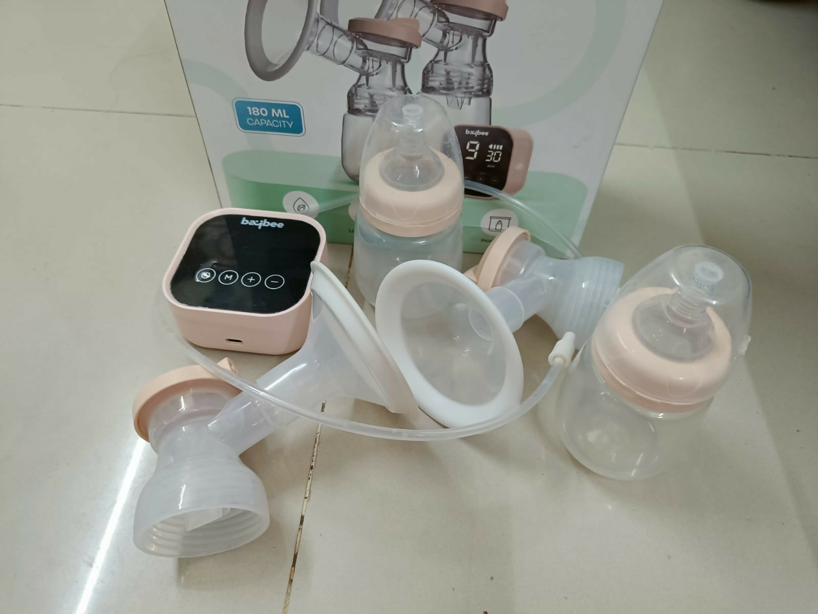 Experience efficient, comfortable, and safe milk expression with the BAYBEE Double Electric Breast Pump, designed for modern moms on the go!