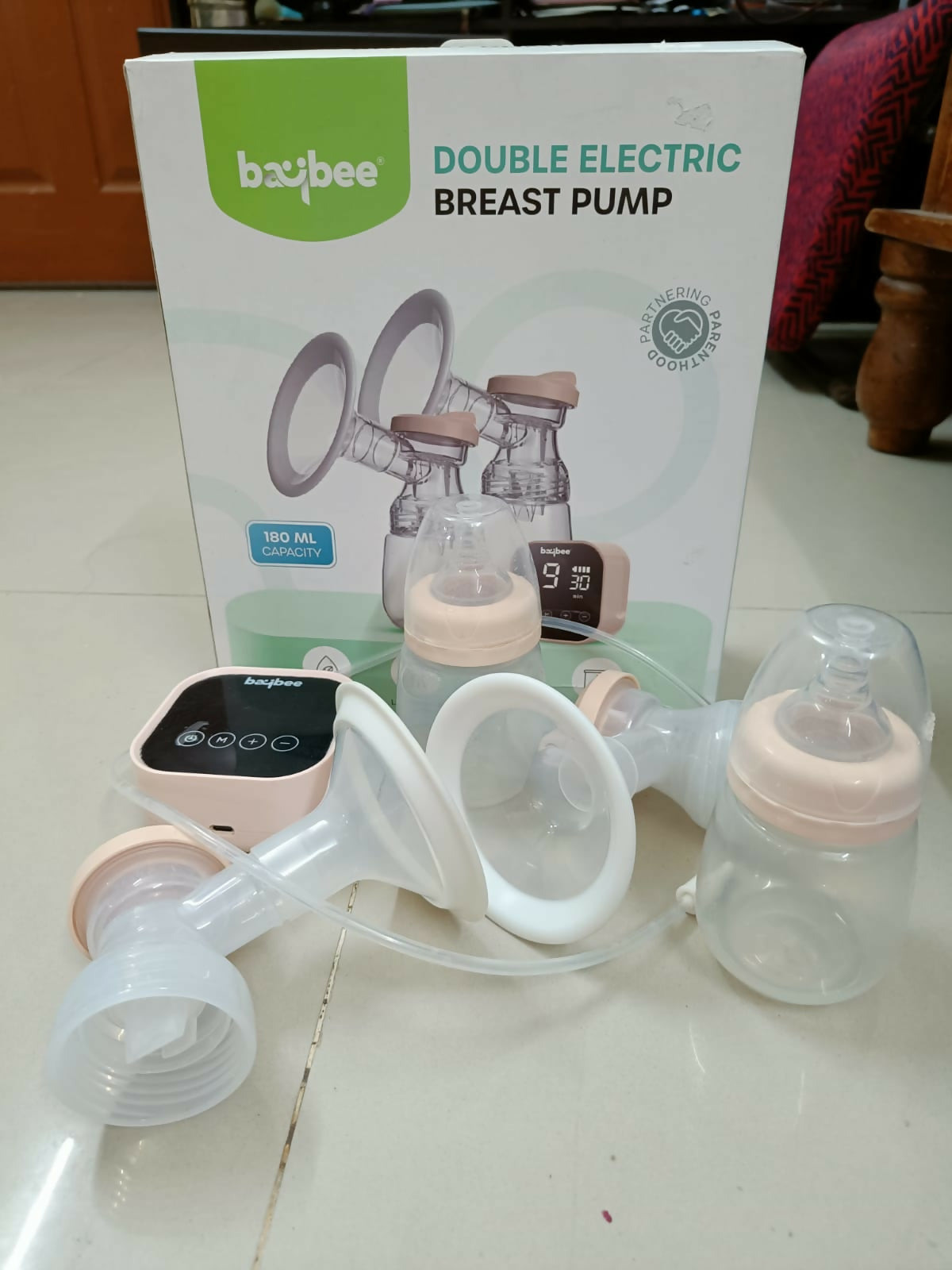 Experience efficient, comfortable, and safe milk expression with the BAYBEE Double Electric Breast Pump, designed for modern moms on the go!