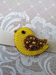 Add a pop of fun to your child's hairstyle with the Tweety Bird Beaded Clip – a delightful accessory featuring everyone's favorite yellow canary, perfect for young fans of the beloved cartoon character. Crafted with colorful beads and designed for durability, this clip adds charm and personality to any ensemble.