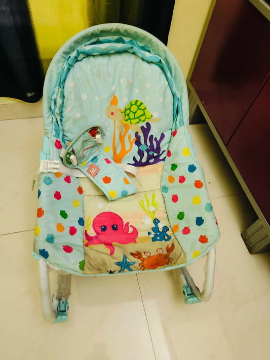  Infantso Rocker/Bouncer for Baby - Comfort, Safety, and Entertainment in One Portable Design.