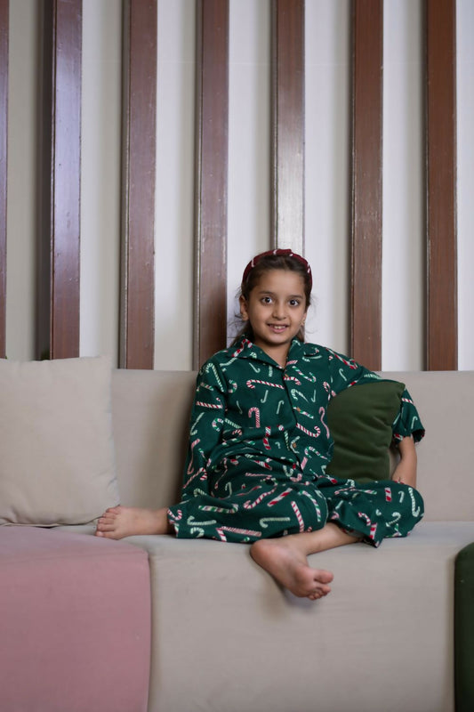 Transform bedtime into a sweet retreat with Candy Cane Delight nightwear.