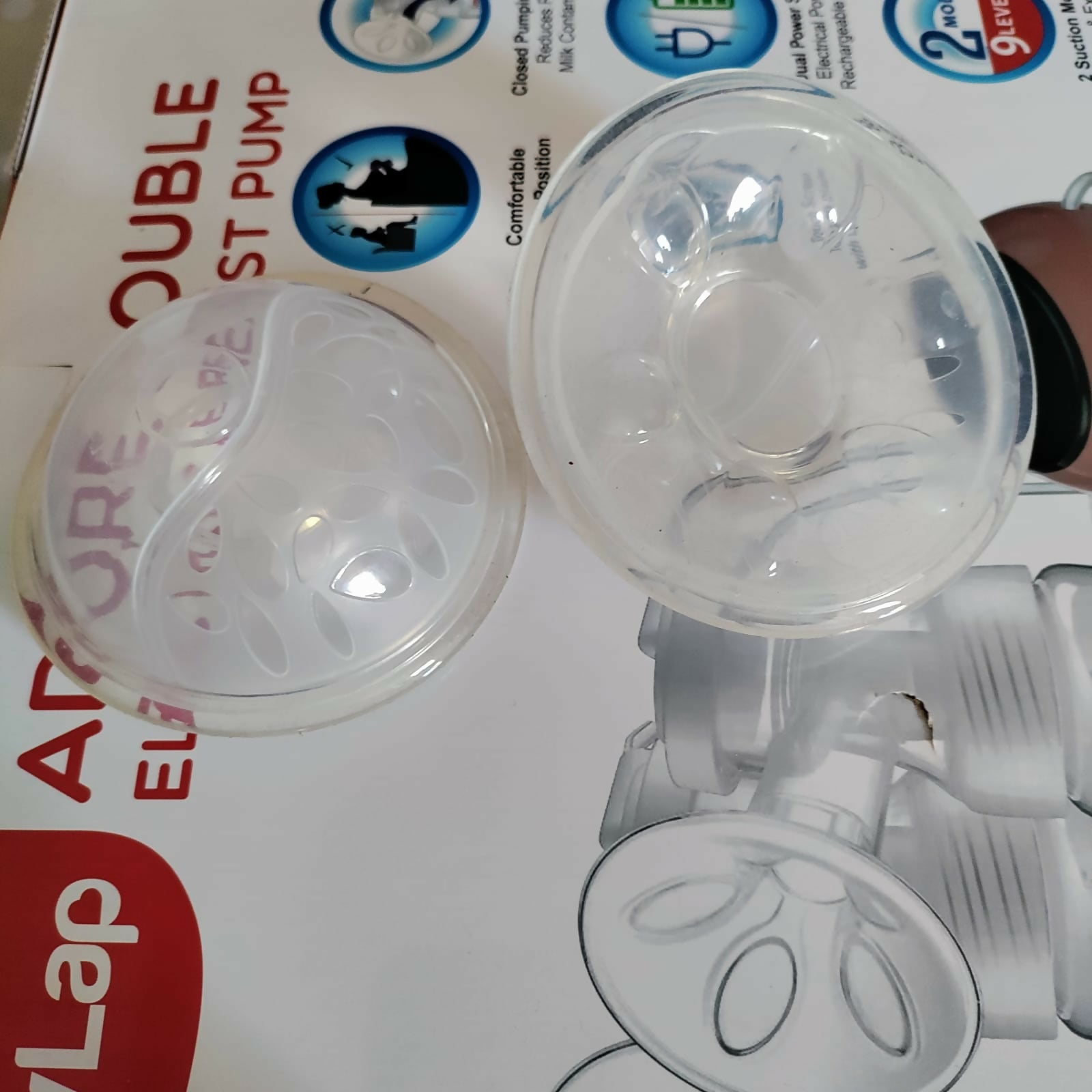 LuvLap Adore Double Electric Breast Pump – dual-mode, silicone cushion, BPA-free, rechargeable battery, adjustable suction for efficient and comfortable breastfeeding.