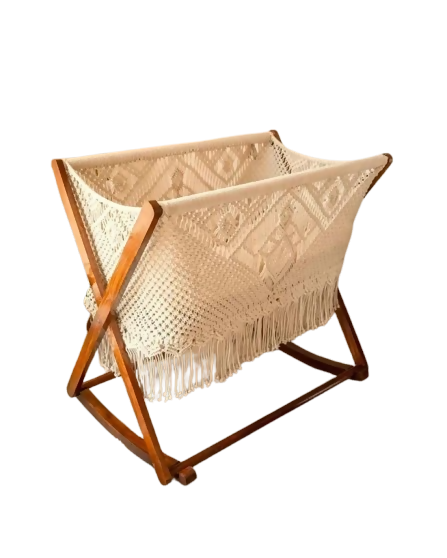 Bring warmth and tranquility to your nursery with this artisanal Macrame Baby Cradle, crafted from natural cotton for a cozy, stylish sleep space.






