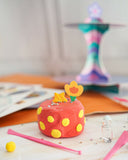 The ilearnngrow Dessert Clay Kit for Kids allows young artists to create their own miniature dessert masterpieces using colorful air-dry clay.