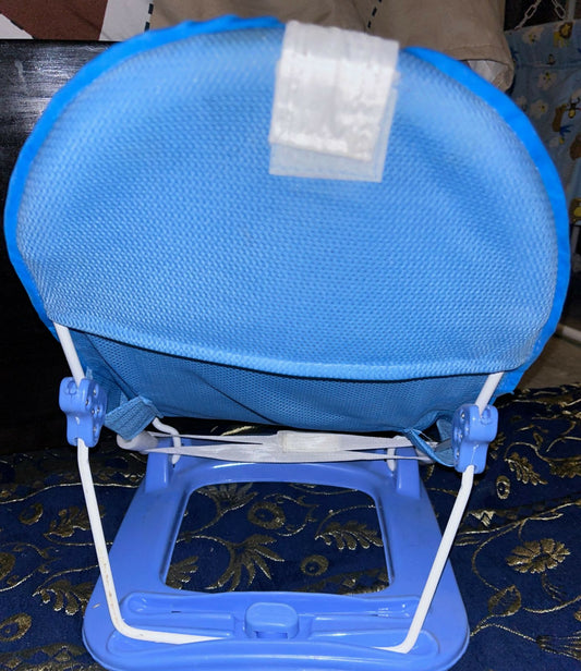 Discover the DELUXE Baby Bather, offering a secure mesh sling, ergonomic design, and easy storage for safe and comfortable baby baths.