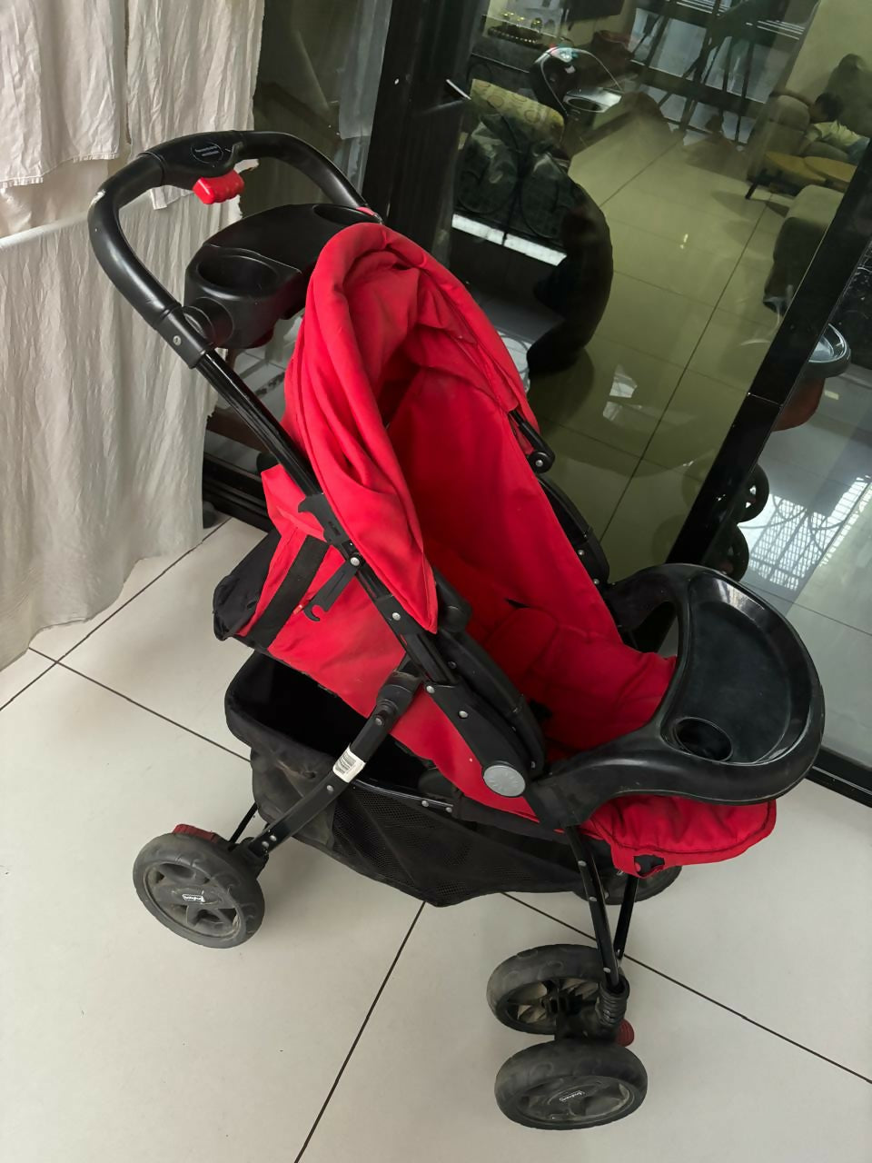 Discover the versatile BABYHUG Stroller/Pram for Baby, featuring a reversible handle, five-point safety harness, and large adjustable canopy for ultimate comfort and protection.