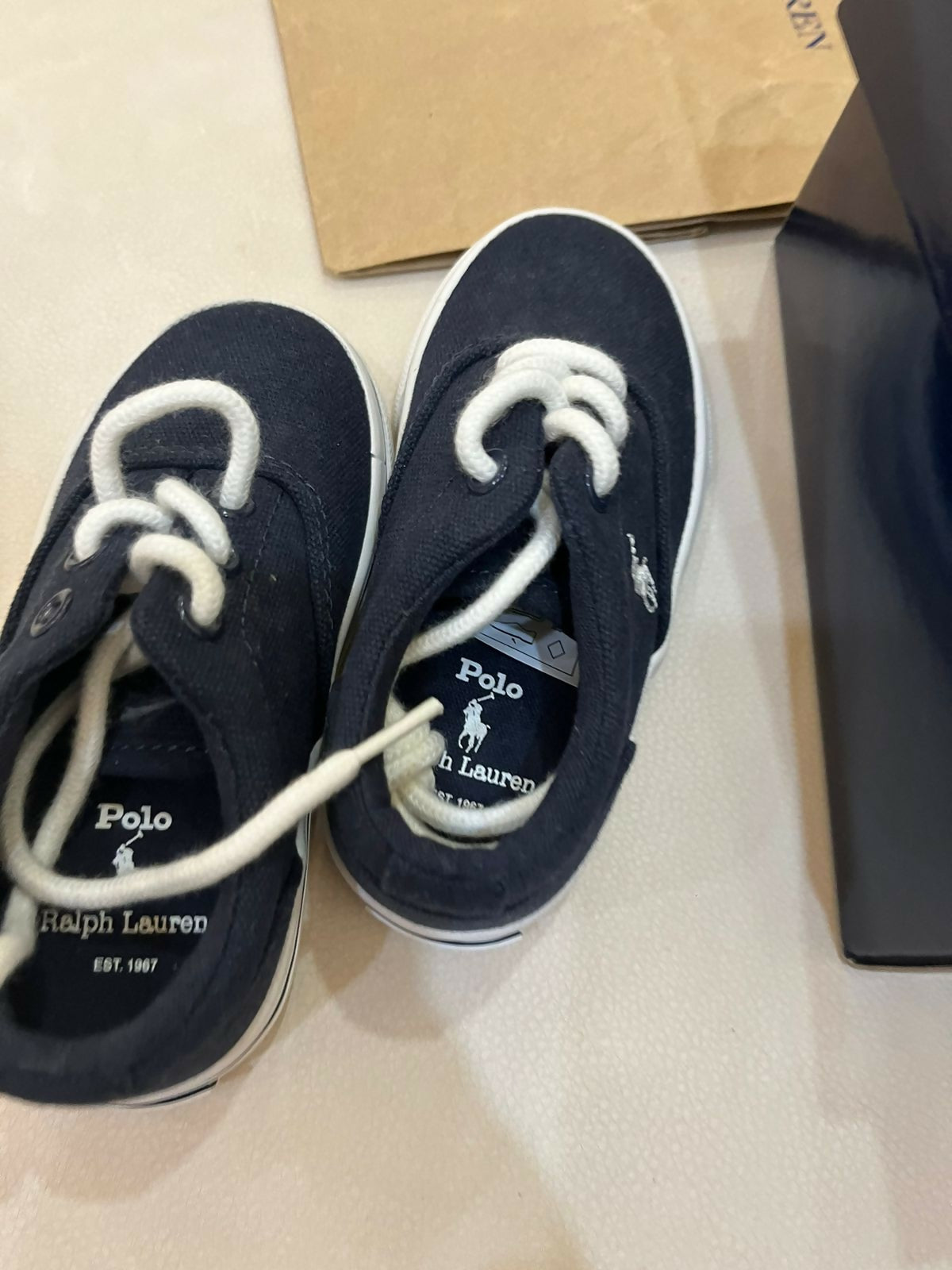 Premium Ralph Polo baby shoes from Europe with stylish design, breathable comfort, and non-slip soles for safety and elegance.