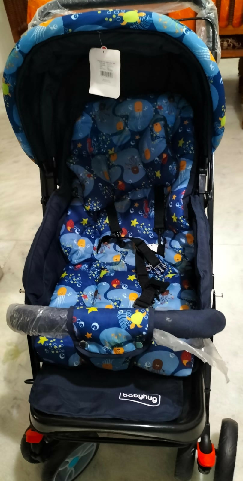 Comfortable and secure BABYHUG Stroller/Pram with a 5-point safety harness, multi-position reclining seat, and easy foldable design.