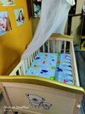 JUSTBORN Rocking Crib with One Side Openable Attached to Bed with Wheels and Mosquito Net , Dimensions:- L -41 inch , W- 24 inch , H- 30 inch - PyaraBaby