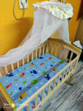 JUSTBORN Rocking Crib with One Side Openable Attached to Bed with Wheels and Mosquito Net , Dimensions:- L -41 inch , W- 24 inch , H- 30 inch - PyaraBaby