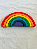 Explore colors and develop skills with our Rainbow Stacker Game - a fun and educational toy for little learners!